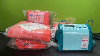 Mixed Lot Including 4 x Protective Suits and 1 x Transair Mattress Replacement Pump (Powers Up) *SN W101261*