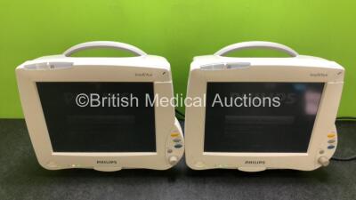 4 x Philips IntelliVue MP50 Patient Monitors *2 in Photos - 4 in Total* (All Power Up with Cracks in Casing, 2 x Missing Badges - See Photos)