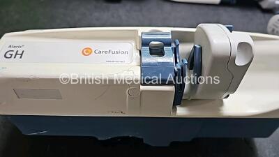 Job Lot Including 8 x CareFusion Alaris GH Syringe Pumps ( All Power Up, 1 x Damage Casing- See Photo) *SN 800272995 / 800210716 / 800214002 / 800271129 / 800284435 / 800258200 / 800214382 / 800273250* - 5