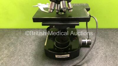 Olympus Wild M20 Benchtop Microscope with 2 x Leitz 10x/18 Eyepieces and 4 x Wild Optics *1 x 10/0,25 / 1 x 40/0,65 / 1 x Hl 50/1,0 and 1 x HL 100/1,25* (Untested Due to Foreign Plug) *SN NA* - 5