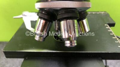 Olympus Wild M20 Benchtop Microscope with 2 x Leitz 10x/18 Eyepieces and 4 x Wild Optics *1 x 10/0,25 / 1 x 40/0,65 / 1 x Hl 50/1,0 and 1 x HL 100/1,25* (Untested Due to Foreign Plug) *SN NA* - 7