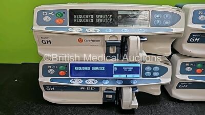 Job Lot 2 x BD Alaris GH Guardrails Plus Syringe Pumps, 2 x CareFusion Alaris GH Syringe Pumps, 1 x CareFusion Alaris Plus GH Pump and 1 x CareFusion Alaris Guardrails Plus GH Syringe Pump ( All power up, 3 x Requires Services and 2 x Cracks in Casing - S - 2