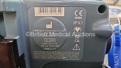 Job Lot 2 x BD Alaris GH Guardrails Plus Syringe Pumps, 2 x CareFusion Alaris GH Syringe Pumps, 1 x CareFusion Alaris Plus GH Pump and 1 x CareFusion Alaris Guardrails Plus GH Syringe Pump ( All power up, 3 x Requires Services and 2 x Cracks in Casing - S - 8