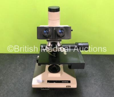 Olympus BH2 Benchtop Microscope with 2 x WHK 10X/20 L Eyepieces and 4 x Optics *1 x DPlan 50 0,90 Oil / 1 x SPlan 10 01,25 Oil / 1 x SPlan 10 0,30 and 1 x SPlan 40 0,70* (No Power) *SN NA*