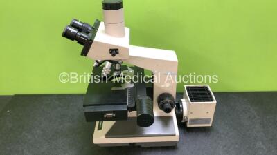 Olympus BH2 Benchtop Microscope with 2 x WHK 10X/20 L Eyepieces and 4 x Optics *1 x DPlan 50 0,90 Oil / 1 x SPlan 10 01,25 Oil / 1 x SPlan 10 0,30 and 1 x SPlan 40 0,70* (No Power) *SN NA* - 10