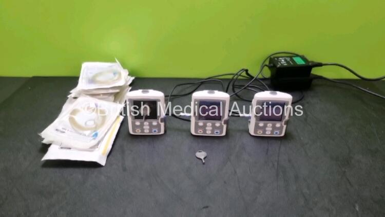 3 x Smiths Medical CADD Model 2110 Ambulatory Infusion Pumps with 3 x Rechargeable Battery Packs (All Power Up) with 2 x Power Supplies, 2 x Keys and 8 x CADD Extension Sets *SN 1031299 / 1031304 / 1031302* (her)