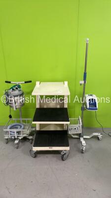 Mixed Lot Including 1 x Fisher&Paykel AIRVO 2 Humidifier on Trolley *Mfd 2018* (Powers Up) 1 x Stack Trolley (Unknown Manufacturer) ans 1 x Nilfisk Advance Vacuum on Trolley (Powers Up) *181012079329 / NA*