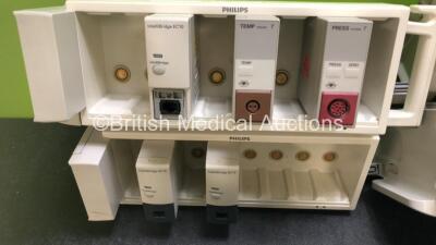 7 x Philips M8048A Module Racks with 21 Various Modules (Some with Damage to Casing - See Photos) *SN DE502B1093 / DE502B1917 / DE502B1931 / DE502B6872 /DE502B1919 / DE502B1916 / DE502B1922* - 6