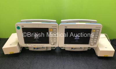 2 x Drager Infinity Delta Patient Monitors with HemoMed 1, Aux/Hemo 3, NBP and MultiMed Options, 2 x Docking Stations and 2 x Power Supplies (Both Power Up with Damage to Casing - See Photos) *SN 6004178571 / 6000466277*