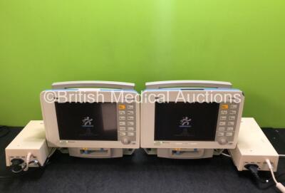 2 x Drager Infinity Delta Patient Monitors with HemoMed 1, Aux/Hemo 3, NBP and MultiMed Options, 2 x Docking Stations and 2 x Power Supplies (Both Power Up with Damage to Casing - See Photos) *SN 6000467178 / 6000456475*