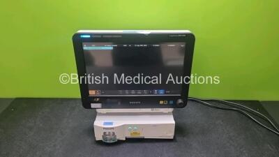 Philips IntelliVue MX700 Touch Screen Patient Monitor Software Version H.15.41 *Mfd 2015* (Powers Up, Damage to Casing - See Photo) with 1 x Philips IntelliVue G5 M1019A Gas Module (Powers Up) *SN DE12504170 / ASDB0208*