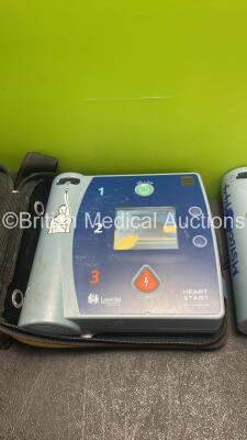 1 x Laerdal FR2+ Defibrillator in Carry Case (Powers Up with Damaged Screen-See Photo) 1 x Laerdal FR2 Defibrillator (Powers Up and Fails Self Test) with 2 x Batteries *Install Dates 09-2020, 11-2021* - 2