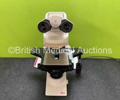 Leica DM2000 Benchtop Microscope with 2 x HC Plan 10x/20 Eyepieces and 3 x Leica Optics *1 x HI Plan 10x/0.25 PH1, 1 x HI Plan 40x/0.65 PH2 and 1 x N Plan 100x/1.25-0.60 Oil* (Powers Up with Good Bulb)