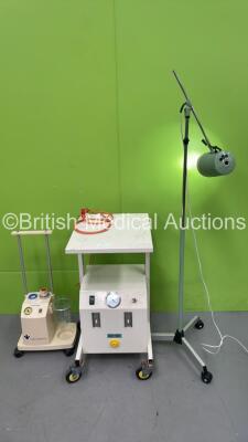 Mixed Lot Including 1 x Seward Examination Light on Stand, 1 x Therapy Equipment Suction Unit on Wheels (Both Power Up) and 1 x Covidien Suction Trolley (No Power)