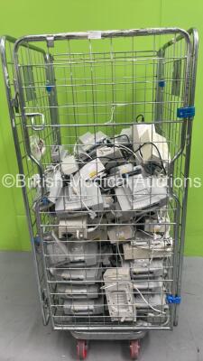 Large Quantity of Drager Power Supplies and Drager Docking Stations (Cage Not Included)