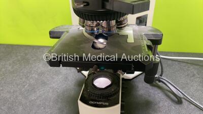 Olympus BX51TF Benchtop Microscope (Powers Up) with 2 x Olympus 10x/22 Eyepieces, 1 x Hitachi HV-C20AMP Camera (Powers Up) and 7 x Optics *1 x Plan 2x/0.05, 1 x UPlan Fl 4x/0.13, 1 x UPlan Fl 10x/0.30, 1 x UPlan Fl 20x/0.50, 1 x UPlan Apo 40x/0.85, 1 x UP - 2