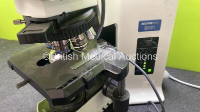 Olympus BX51TF Benchtop Microscope (Powers Up) with 2 x Olympus 10x/22 Eyepieces, 1 x Hitachi HV-C20AMP Camera (Powers Up) and 7 x Optics *1 x Plan 2x/0.05, 1 x UPlan Fl 4x/0.13, 1 x UPlan Fl 10x/0.30, 1 x UPlan Fl 20x/0.50, 1 x UPlan Apo 40x/0.85, 1 x UP - 3