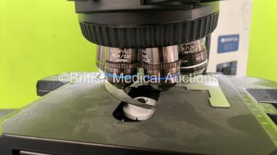 Olympus BX51TF Benchtop Microscope (Powers Up) with 2 x Olympus 10x/22 Eyepieces, 1 x Hitachi HV-C20AMP Camera (Powers Up) and 7 x Optics *1 x Plan 2x/0.05, 1 x UPlan Fl 4x/0.13, 1 x UPlan Fl 10x/0.30, 1 x UPlan Fl 20x/0.50, 1 x UPlan Apo 40x/0.85, 1 x UP - 14