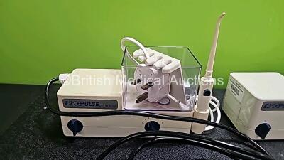 Job Lot Including 3 x Propulse Ear Irrigation Units (1 x with Foot switch, Damaged Handpiece - See Photo, 1 x Missing Container and 3 x Missing Covers), 1 x ProPulse II Ear Irrigation Unit with Missing Cover and 3 x ProPulse II Foot Switches *SN* - 3