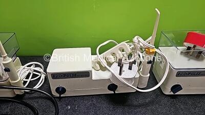 Job Lot Including 3 x Propulse Ear Irrigation Units (1 x with Foot switch, Damaged Handpiece - See Photo, 1 x Missing Container and 3 x Missing Covers), 1 x ProPulse II Ear Irrigation Unit with Missing Cover and 3 x ProPulse II Foot Switches *SN* - 4