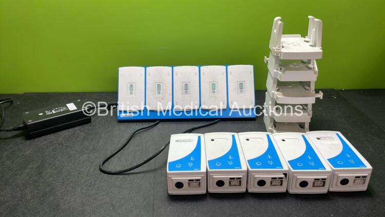 Job Lot Including 1 x Ortivus BC-5 Battery Charger with 5 x Ortivus M531 Measuring Units, 5 x Mounting Brackets and 10 x Ortivus B-500 Batteries with Power Supply (Powers Up, 4 Measuring Units with Missing Labels-See Pictures)