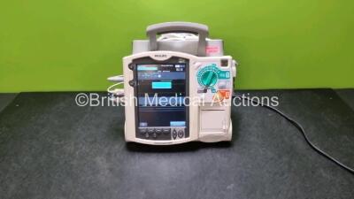 Philips Heartstart MRx Defibrillator Including Pacer, ECG, SpO2, NIBP, CO2 and Printer Options (Powers Up) with 1 x Philips M3538A Battery, 1 x Philips M3539A Module, External Paddle Dock, 1 x 3 Lead ECG Lead and 1 x SpO2 Finger Sensor Connector