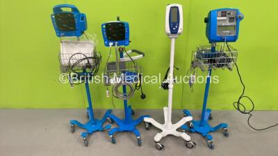 1 x GE Dinamap Carescape V100 Vital Signs Monitor on Stand, 1 x GE ProCare Vital Signs Monitor on Stand, 1 x GE Dinamap Pro 300V2 VItal Signs Monitor on Stand and 1 x Welch Allyn SPOT Vital Signs Monitor on Stand (All Power Up) *S/N (21) 201704336 / SH611