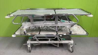 1 x Merivaara Emergo Patient Trolley and 1 x Merivaara Acute Care Line Patient Trolley