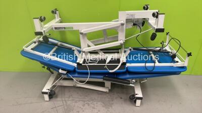 1 x Plinth 2000 Electric Patient Examination Couch with Controller (No Power) and 1 x Plinth Medical 500 Series Electric Patient Examination Couch with Controller (Powers Up) *S/N 503EAB12226240C*