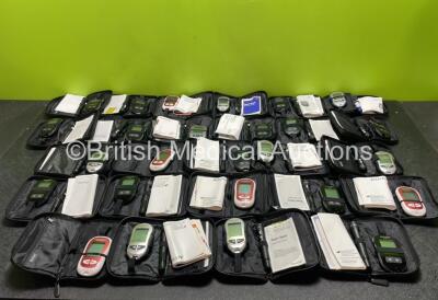 26 x Accu-Chek Blood Glucose Monitors in Cases