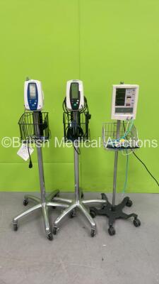 1 x Welch Allyn SPOT Vital Signs Monitor on Stand, 1 x Welch Allyn 420 Series Vital Signs Monitor on Stand and 1 x Datascope Accutorr Plus Vital Signs Monitor on Stand (All Power Up)