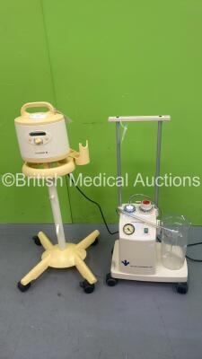 1 x Medela Symphony Suction Pump on Stand and 1 x Therapy Equipment Ltd Suction Pump on Stand (Both Power Up)