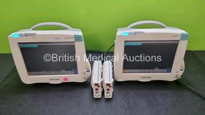 2 x Philips IntelliVue MP50 Patient Monitors (Both Power Up, Both with Crack In Casing - See Photos) with 2 x Philips M3001A Opt C03C06 Module Including ECG, SpO2, NBP, Press and Temp Options *SN DE717N8070 / DE717N8093 / DE44019856 / DE44019863*