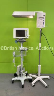 1 x Fisher and Paykel Therapy Lamp on Stand (Powers Up with Good Bulb) and 1 x Drager Infinity Delta Patient Monitor on Stand (Powers Up) *S/N 120727000873*