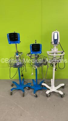 1 x Welch Allyn SPOT Vital Signs Monitor on Stand and 2 x GE Carescape V100 Vital Signs Monitors on Stands (Both Power Up) *S/N SDT10500538SA / SDT08330071SP*