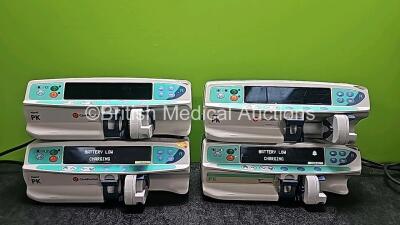 4 x Carefusion Alaris PK Syringe Pumps (2 x Power Up,1 x Draws Power,1 x No Power, 2 x Slight Cracked Light Covers)