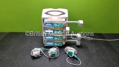 4 x B.Braun Perfusor Space Syringe Pumps (All Power Up) with 1 x B.Braun Space Station, 4 x Pole Clamps and 4 x Power Supplies (3 x Untested Power Supplies) *SN 087564 / 368751 / 368746 / 368720 / 386688*