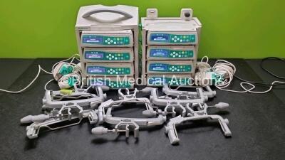 8 x B.Braun Infusomat Space Infusion Pumps (All Power Up) with 2 x B.Braun Space Station, 8 x Pole Clamps and 8 x Power Supplies (7 x Untested Power Supplies) *SN 437992 / 437992 / 437992 / 437089 / 437981 / 437168 / 437882*