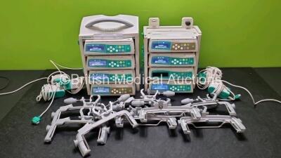 8 x B.Braun Infusomat Space Infusion Pumps (7 x Power Up) with 2 x B.Braun Space Station, 8 x Pole Clamps and 8 x Power Supplies (7 x Untested Power Supplies) *SN 437974 / 37892 / 438009 / 438024 / 438031 / 437900 / 437821 / 437971*