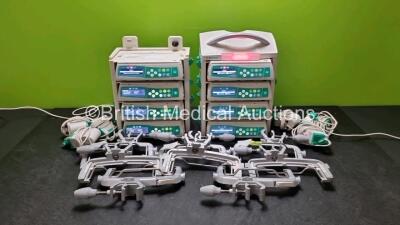 8 x B.Braun Infusomat Space Infusion Pumps (All Power Up) with 2 x B.Braun Space Station, 8 x Pole Clamps and 8 x Power Supplies (7 x Untested Power Supplies) *SN 437147 / 438002 / 437835 / 437941 / na / 437065 / 437012 / 437832*