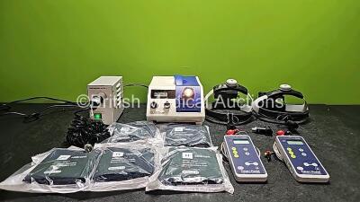 Mixed Lot Including 1 x Schott KL1500 LCD Light Source (Powers Up, Cracked Casing and Faulty Side Door - See Photos), 2 x Unknown Make of Headlights, 1 x Olympus MU-1 Leakage Tester (Powers Up), 2 x Fisher & Paykel Innervator 242 Nerve Stimulator Units wi