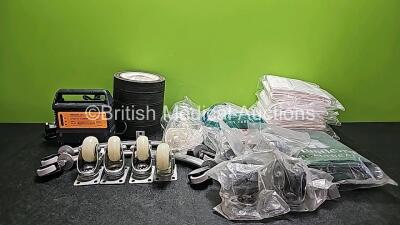 Mixed Lot Including 1 x Karelma Automatic Charger (Powers Up), 15 x Replacement Wheels and Medical Consumables *SN 5SM00911*