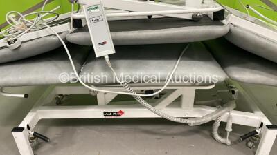 2 x Medi-Plinth Electric Patient Examination Couches with Controllers (1 x Powers Up, 1 x No Power) *S/N 53756 / 54634* - 2