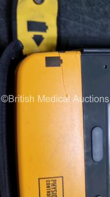 2 x Medtronic Physio Control Lifepak 1000 Defibrillators *Mfd 2012 / 2018* (Both Power Up , 1 x with Crack In Casing - See Photo) with 2 x 3 Lead ECG Leads and 2 x Batteries *Install Before 2023 / 2024* - 6