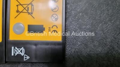 2 x Medtronic Physio Control Lifepak 1000 Defibrillators *Mfd 2011 / 2009* (Both Power Up) with 2 x 3 Lead ECG Leads and 2 x Batteries *Install Before 2023 / 2024* - 6