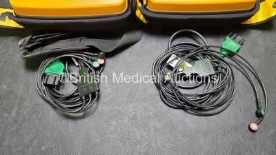 2 x Medtronic Physio Control Lifepak 1000 Defibrillators *Mfd 2012 / 2018* (Both Power Up, 1 x with Crack in Casing - See Photo) with 2 x 3 Lead ECG Leads and 2 x Batteries *Install Before - 2024* - 3