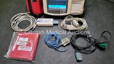 Philips Heartstart MRx Defibrillator with External Hard Paddle (Powers Up) Including Pacer, ECG, BP1, BP2, Temp, SpO2, NIBP, CO2 and Printer Options with Philips M3539A Module, Philips M3538A Battery, Philips M3725A Test Load, SpO2 Finger Sensor, Paddle - 3