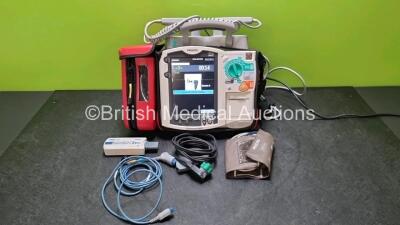 Philips Heartstart MRx Defibrillator with External Hard Paddle (Powers Up) Including Pacer, ECG, BP1, BP2, Temp, SpO2, NIBP, CO2 and Printer Options with Philips M3539A Module, Philips M3538A Battery, Philips M3725A Test Load, SpO2 Finger Sensor, Paddle