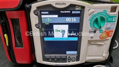 Philips Heartstart MRx Defibrillator with External Hard Paddle (Powers Up) Including Pacer, ECG, BP1, BP2, Temp, SpO2, NIBP, CO2 and Printer Options with Philips M3539A Module, Philips M3538A Battery, Philips M3725A Test Load, SpO2 Finger Sensor, Paddle - 2