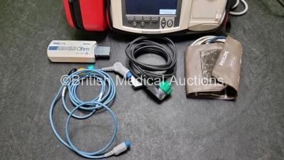 Philips Heartstart MRx Defibrillator with External Hard Paddle (Powers Up) Including Pacer, ECG, BP1, BP2, Temp, SpO2, NIBP, CO2 and Printer Options with Philips M3539A Module, Philips M3538A Battery, Philips M3725A Test Load, SpO2 Finger Sensor, Paddle - 4